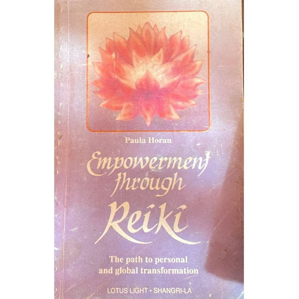 Empowering Through Reiki by Paula Horan