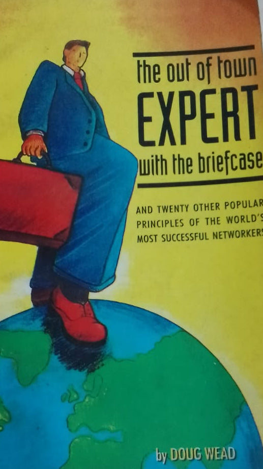 THE OUT OF TOWN EXPERT WITH THE BRIEF CASE BY DOUG WEAD