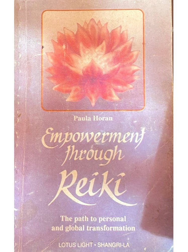 Empowering Through Reiki by Paula Horan