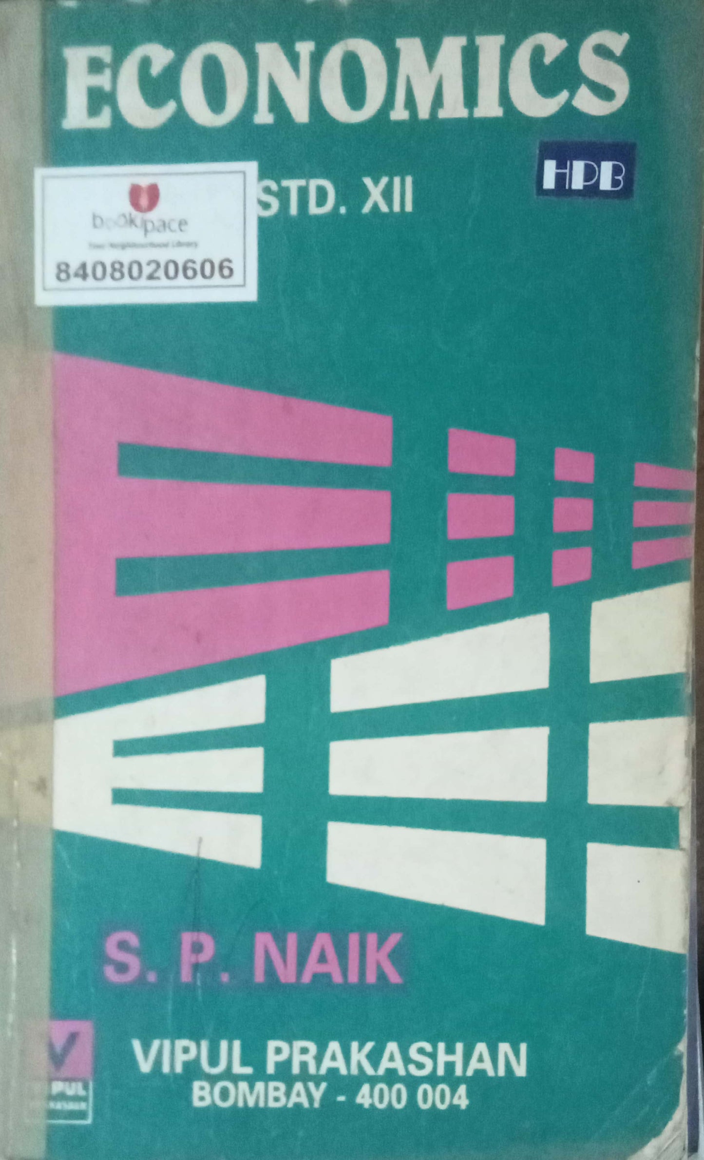Economics STD XII by S.P.Naik