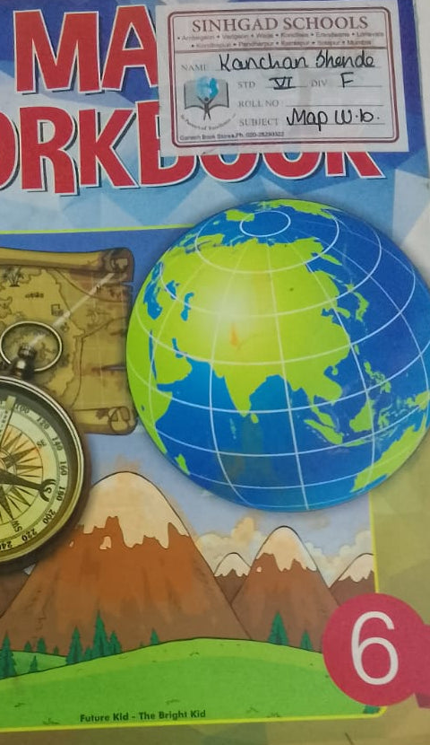 Math workbook with a compass and globe illustration on the cover