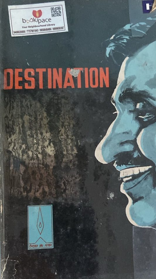 Book cover for 'Destination' featuring a stylized blue-toned portrait of a smiling man on the right and distressed dark background on the left, with the title 'DESTINATION' in large orange-red text. A Bookspace sticker is visible at the top left.