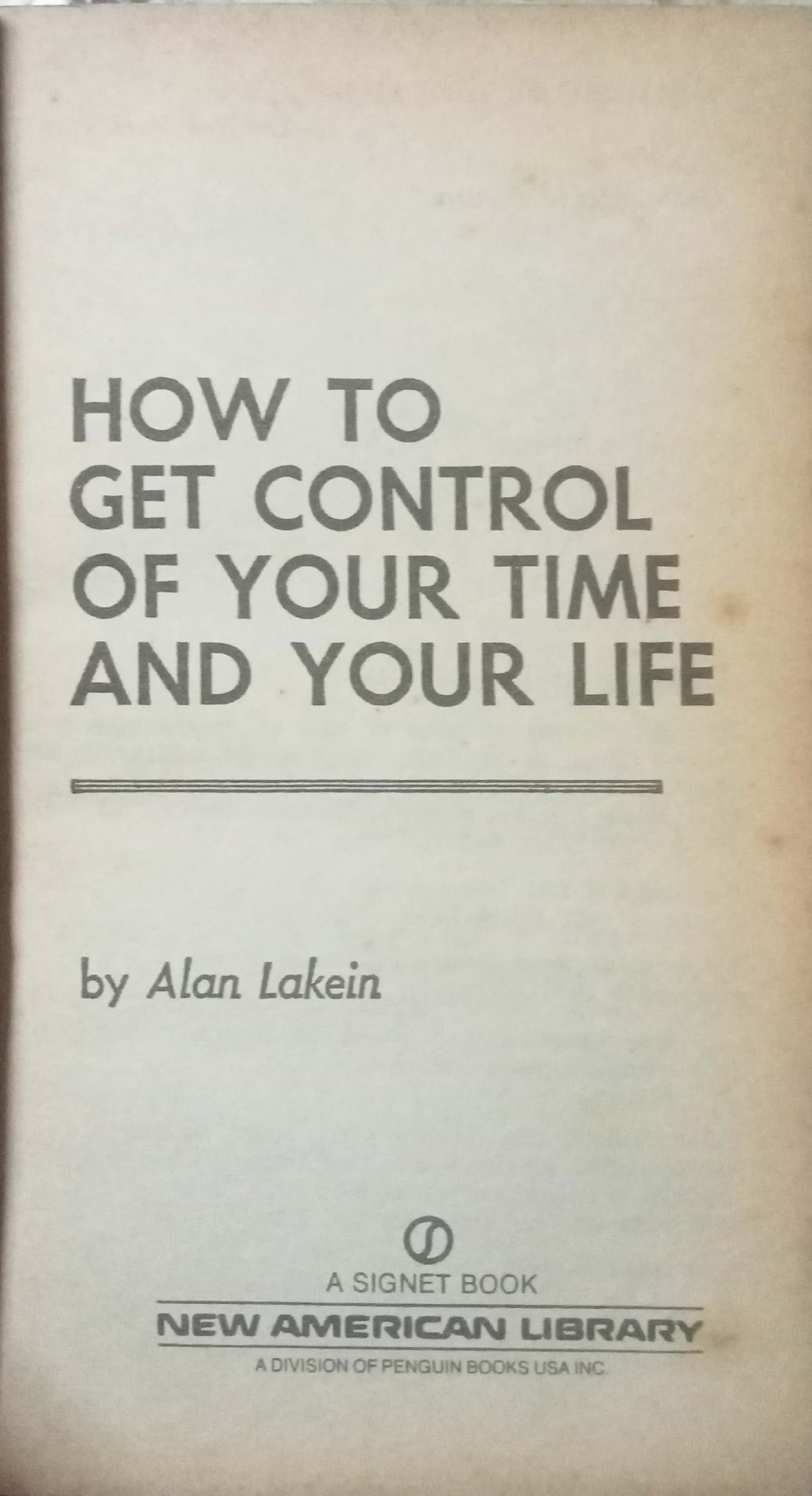 Book cover of 'How to Get Control of Your Time and Your Life' by Alan Lakein with a beige background.