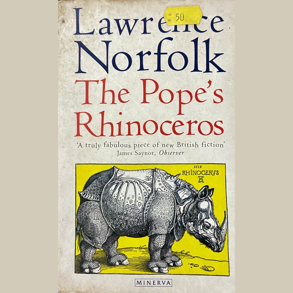 The Pope's Rhinoceros by Lawrence Norfolk  Half Price Books India Books inspire-bookspace.myshopify.com Half Price Books India