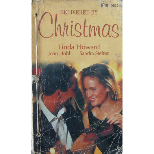 Delivered By Christmas by Lindas Howard  Half Price Books India Books inspire-bookspace.myshopify.com Half Price Books India
